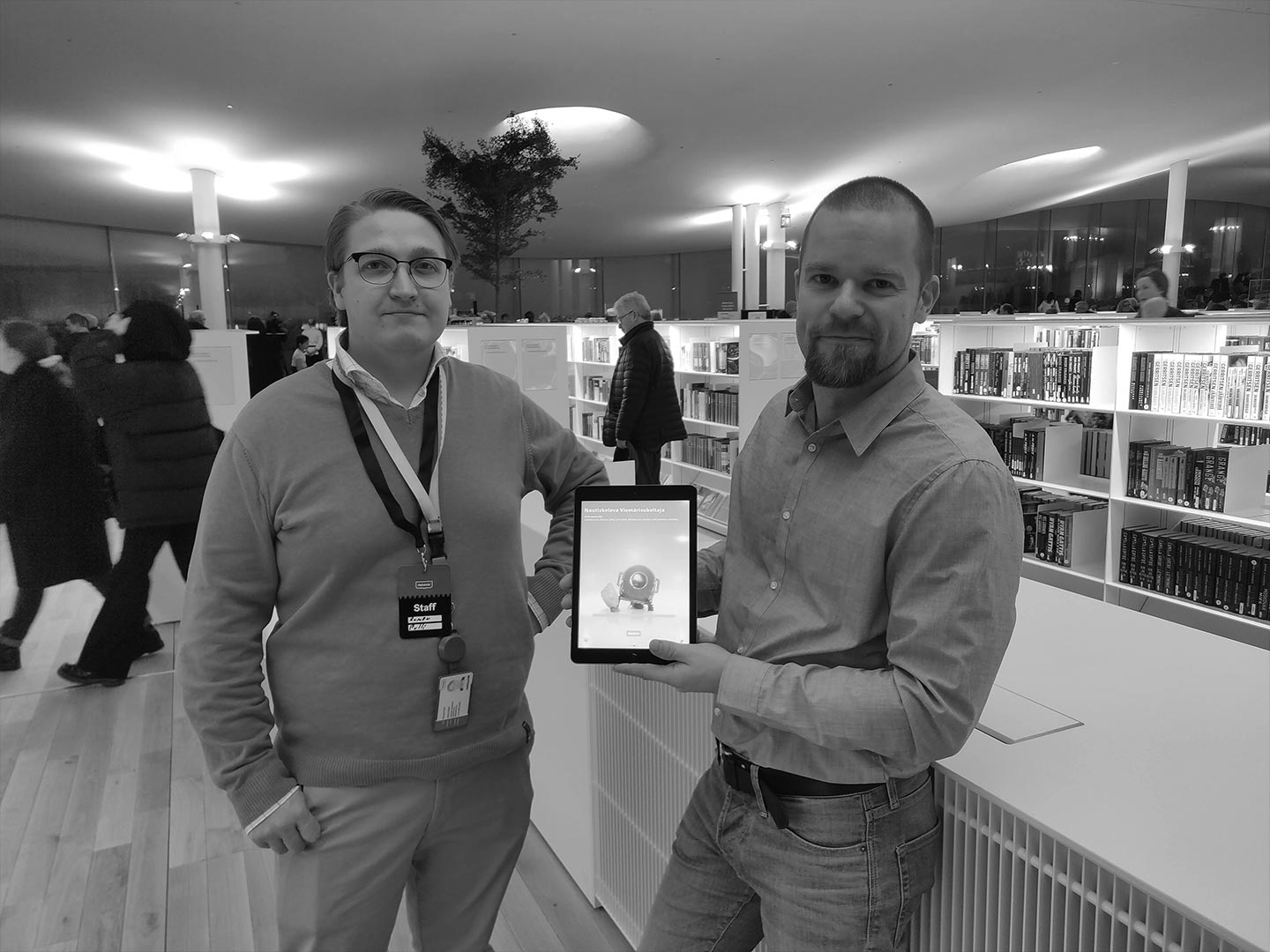 Eero Hammais And Romeo pulli testing Obotti, an app offering information assitants for Helsinki Central Library Oodi.